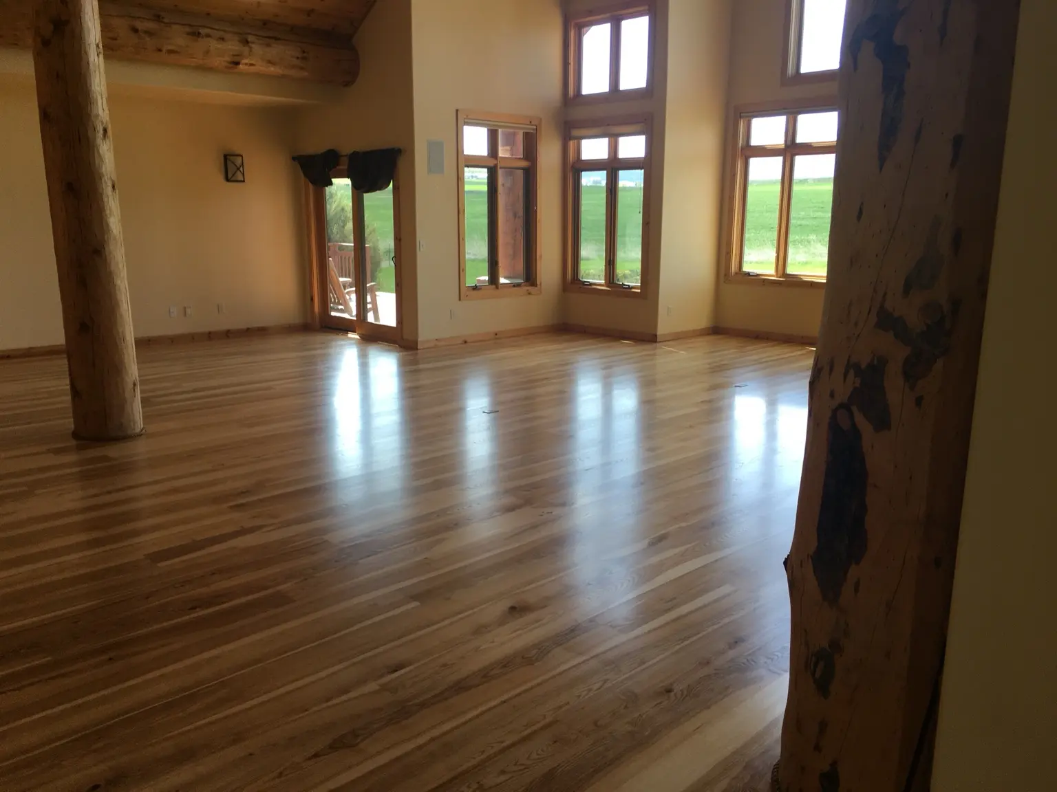Finished hardwood floor in an open Montana home