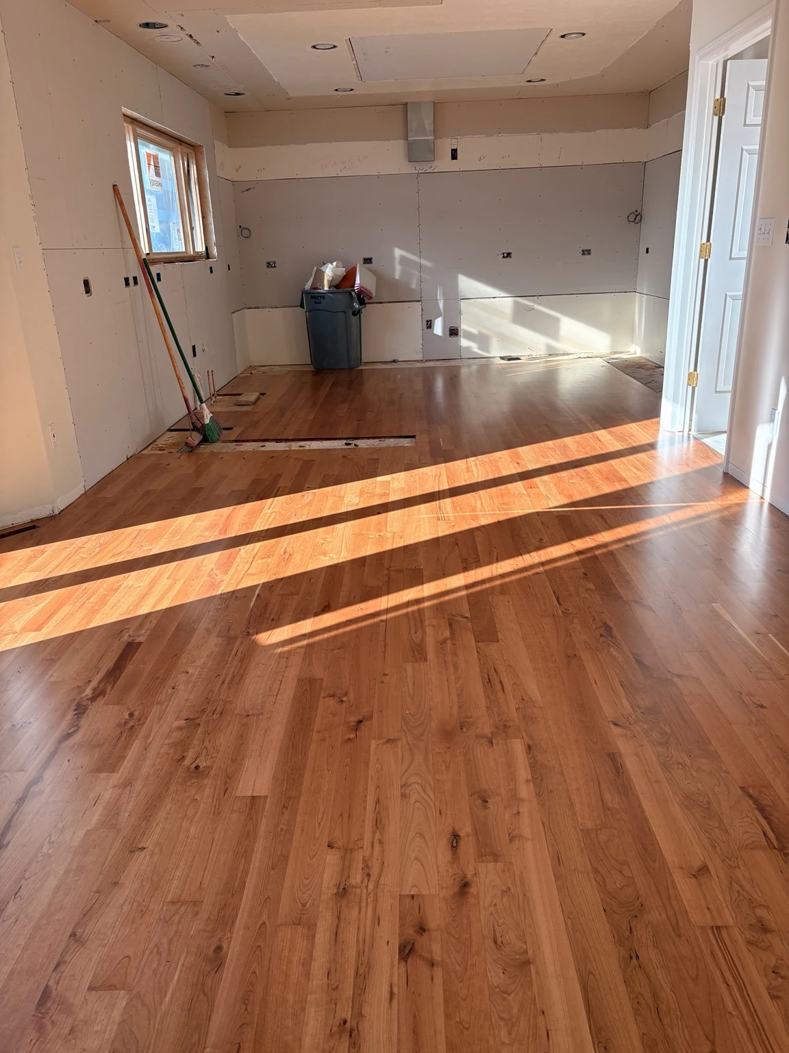 Warm hardwood flooring in a kitchen renovation